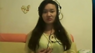 中国の女の子はカムで再生します 中国の女の子はカムで再生します